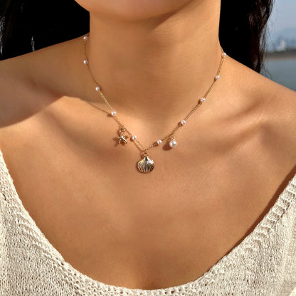 Ocean Opus - Gilded Sea Charm Necklace